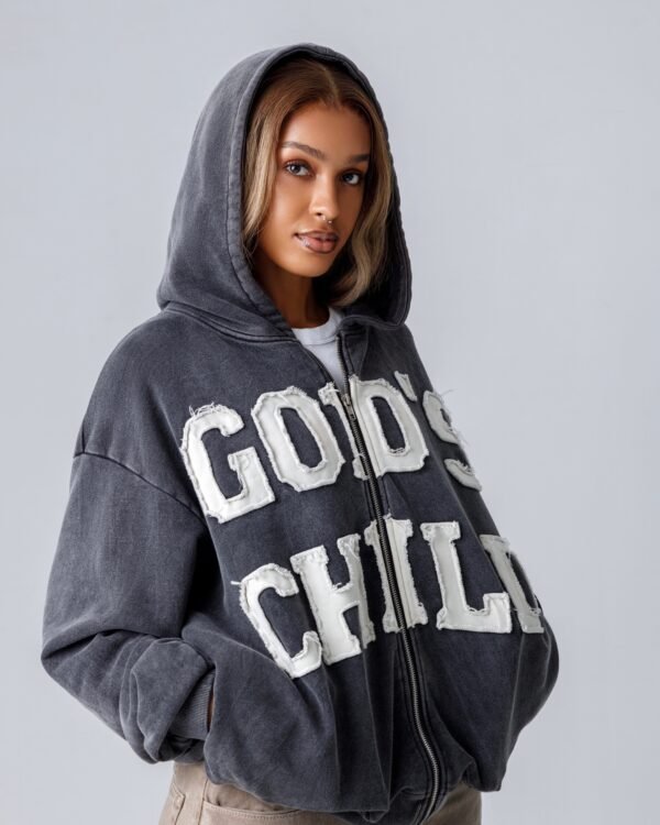 Model wearing a God Child Graphic hoodie